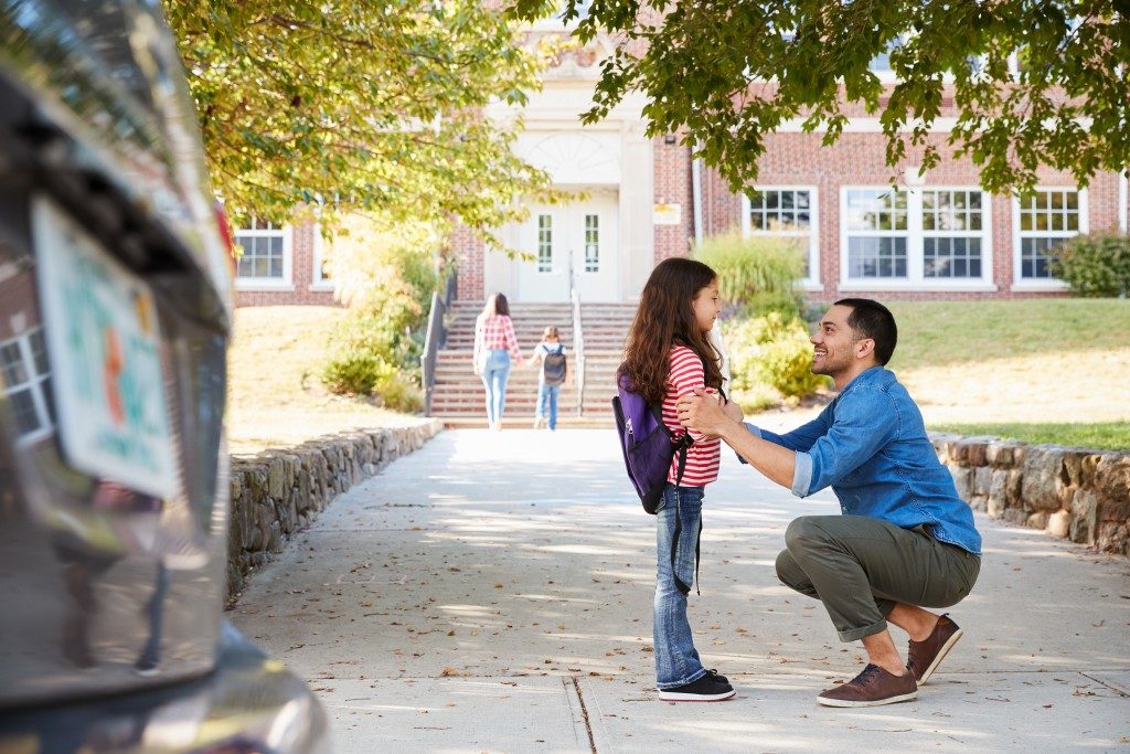 dropping child off to school