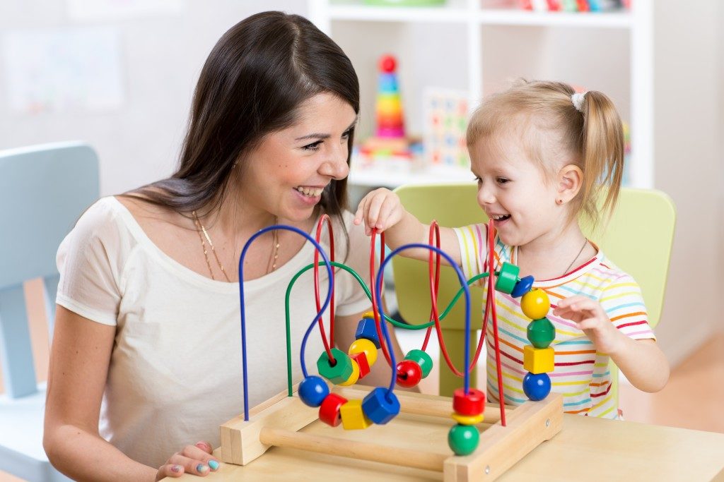 Mother and daughter playing