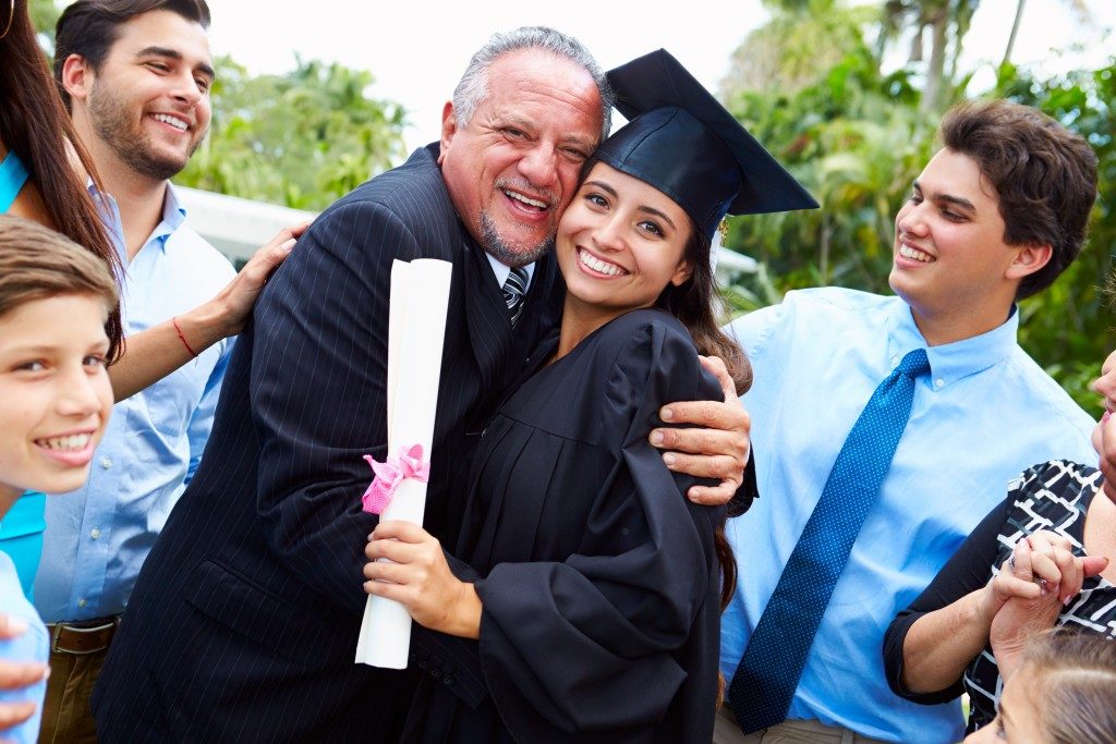 woman who now has a master's degree